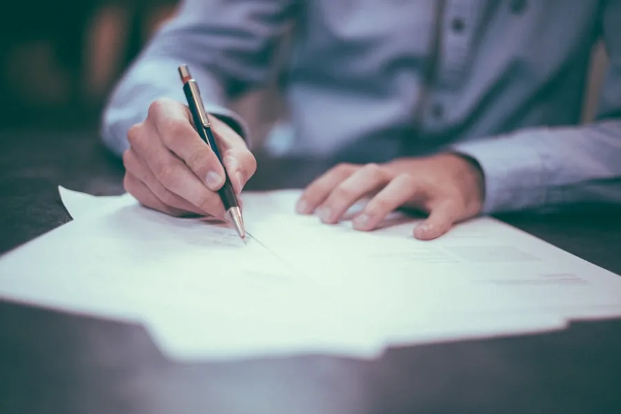 Professional reviewing personal tax documents